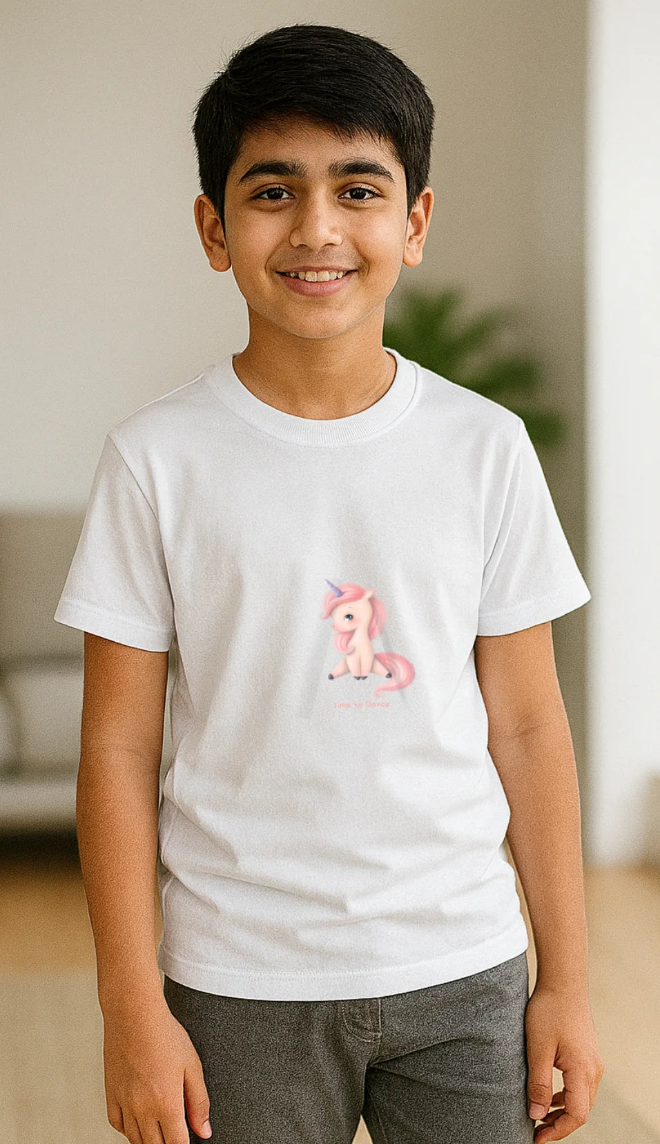 Child wearing a white t-shirt with a pink pony design indoors.