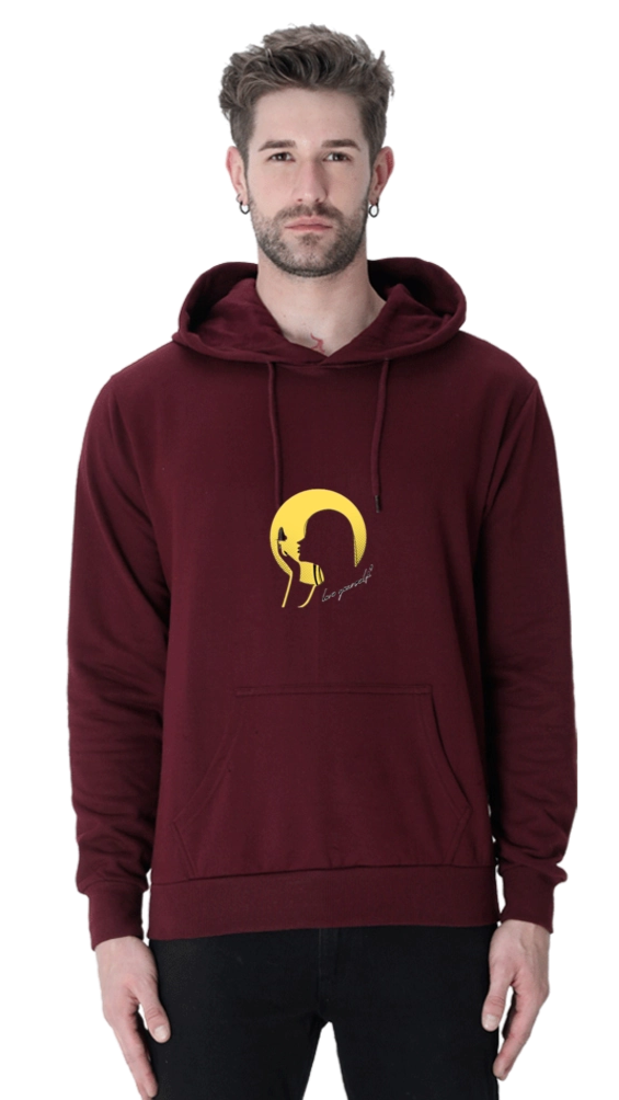 Man wearing a maroon hoodie with a yellow graphic design on a white background