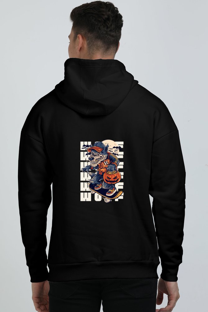 A man wearing a black hoodie with a graphic of a wolf skate boarding and the text 'WOLF' on the back of Graphic.