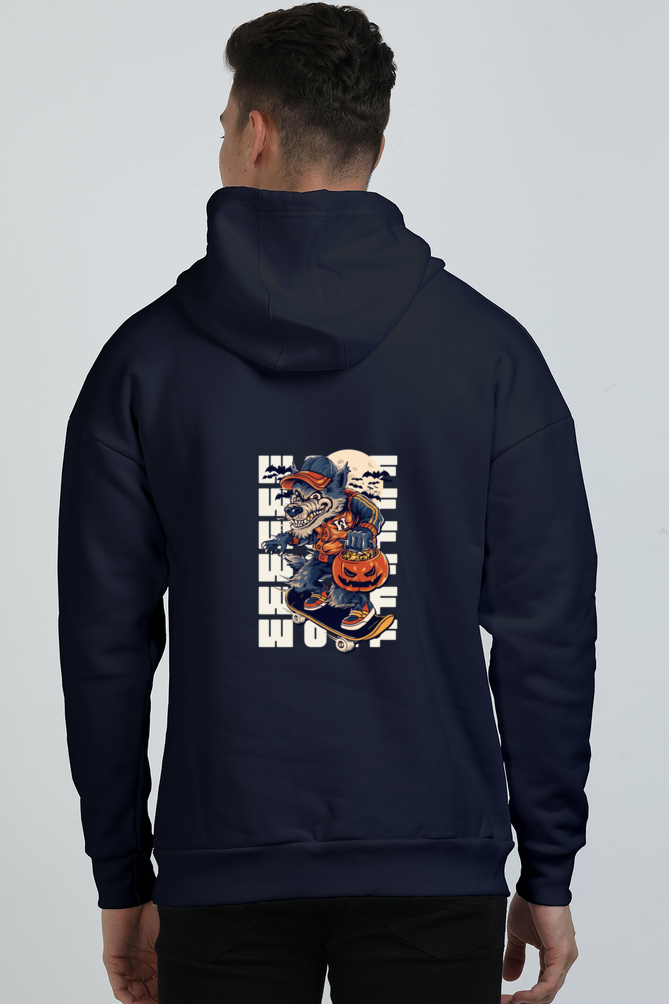 A man wearing a navy blue hoodie with a graphic of a wolf skate boarding and the text 'WOLF' on the back of Graphic.