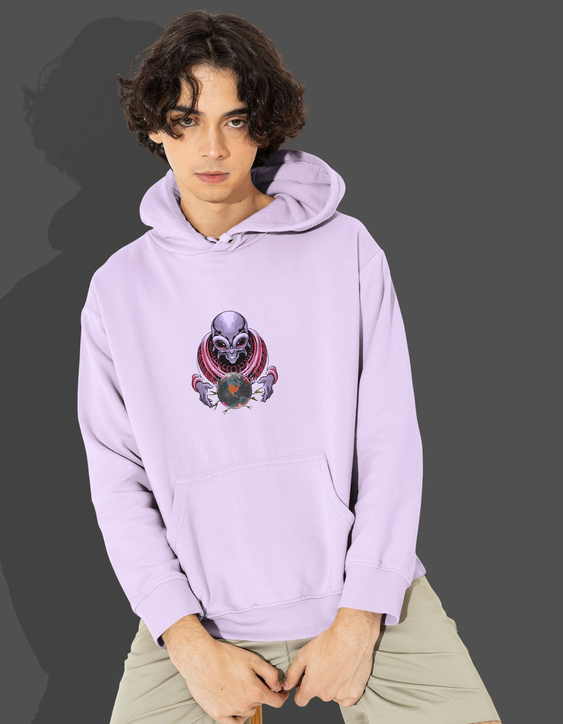 Close-up of Lavender 320 GSM Hoodie. Bold alien bolts urban graphic. Premium cotton pullover.
