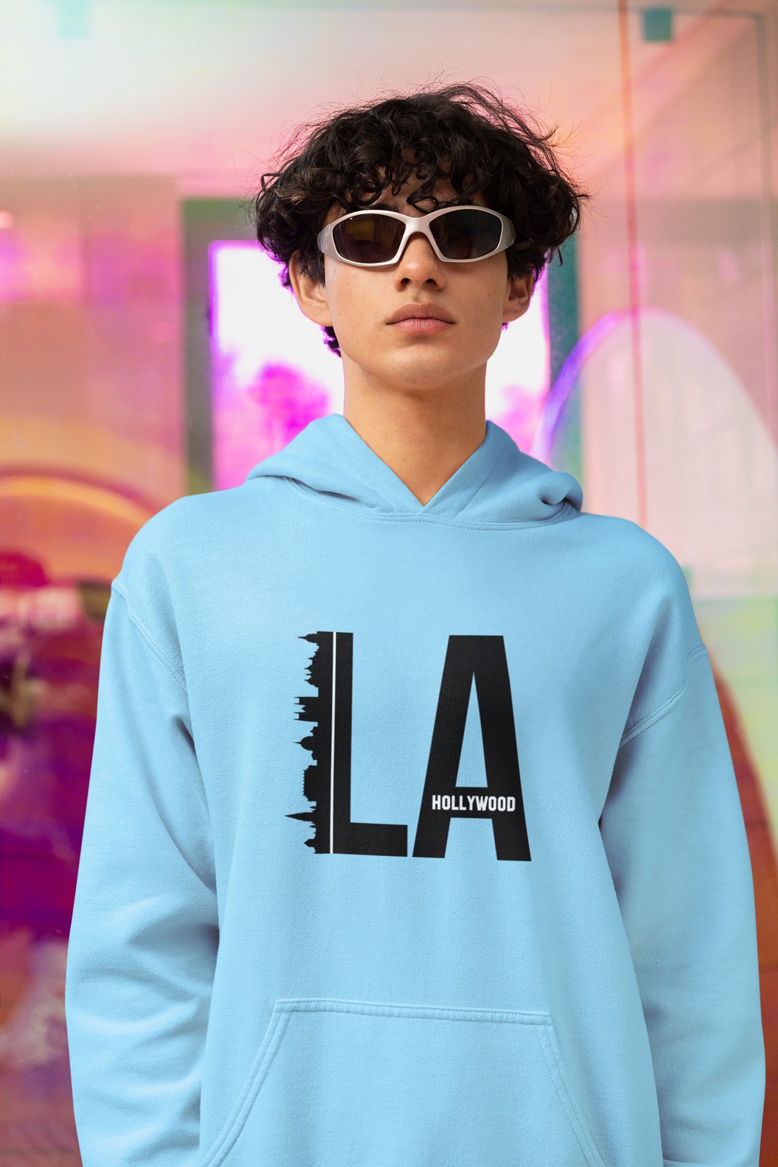Close-up of Baby Blue 320 GSM Hoodie. Bold LA city skyline graphic. Premium cotton pullover.