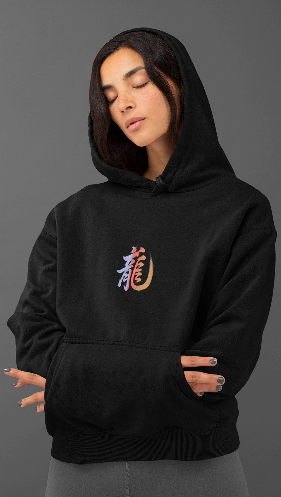 Female model in Black 300 GSM Drip SquadX Dragon Hoodie with bold print for street style look and casual layering.